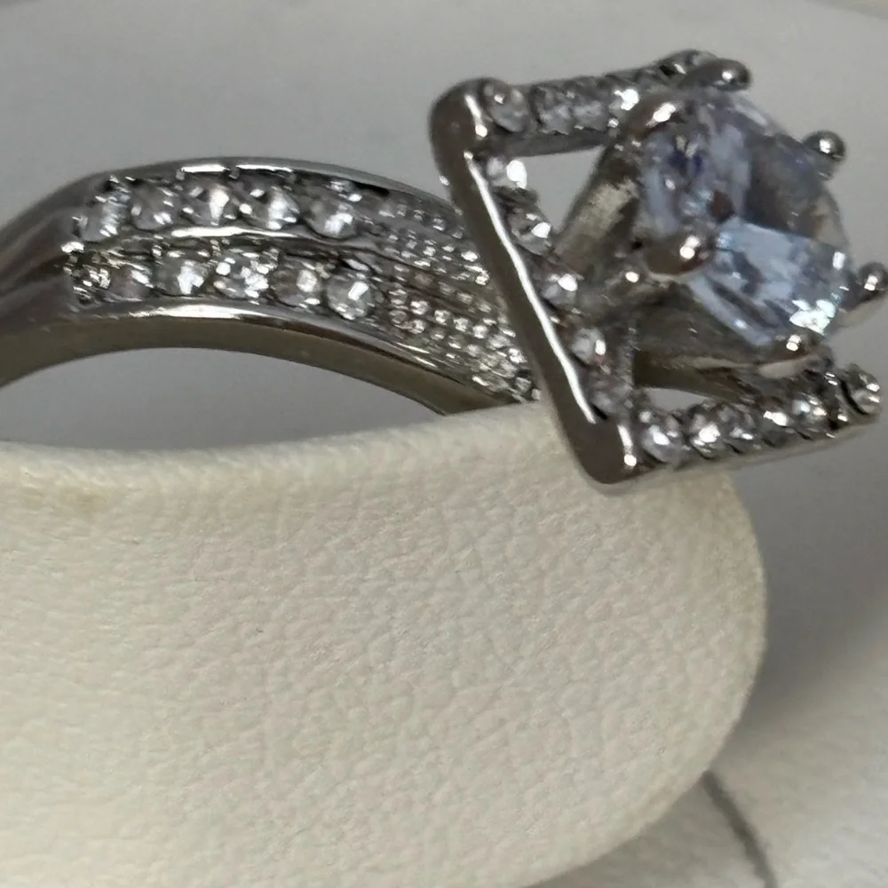 Silver Tone Crystal Ring with diamond shape center piece/size 6.5/ side crystals